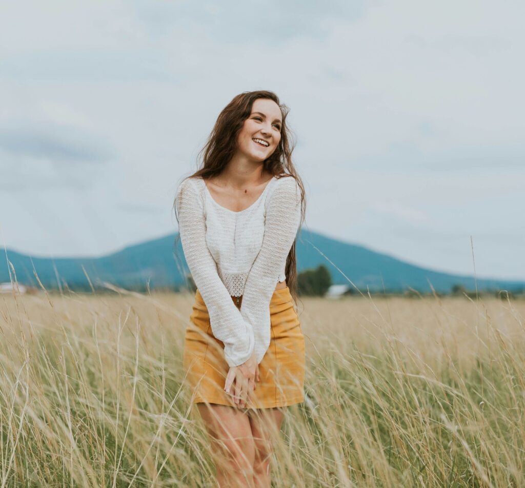 Young woman happy to be using New Beginnings Crisis Pregnancy Center