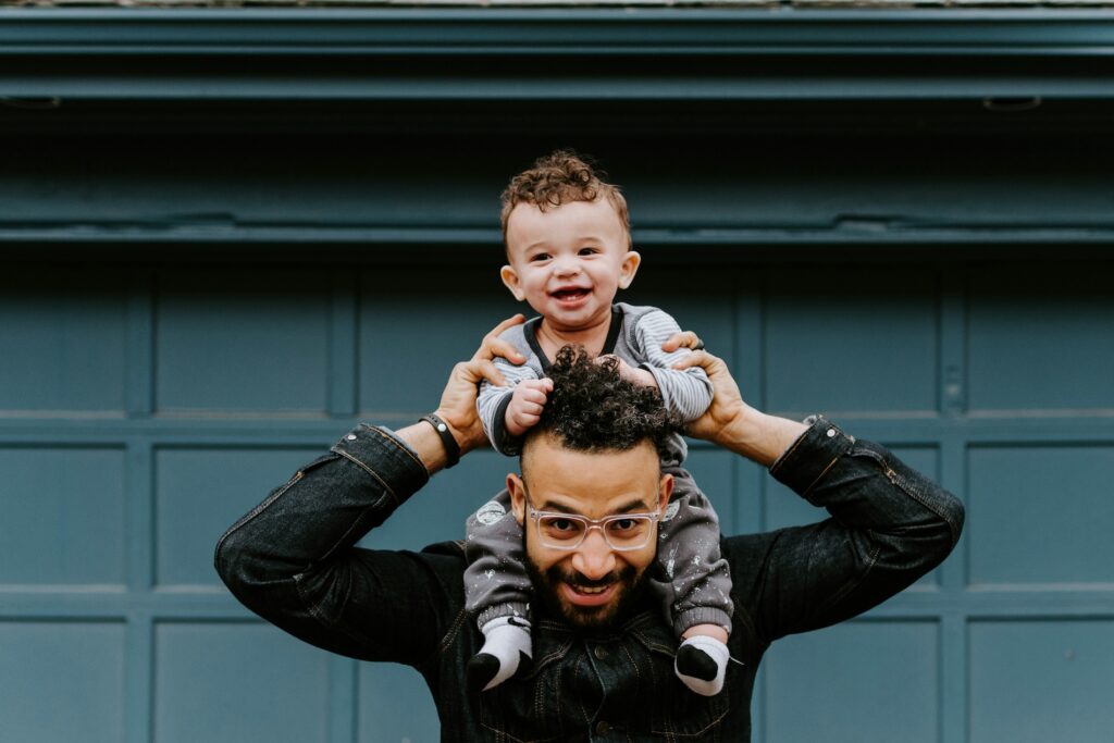 Dad and child happy to be using New Beginnings Crisis Pregnancy Center